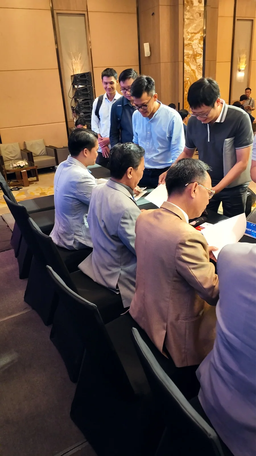 Delegates queuing at the signing area