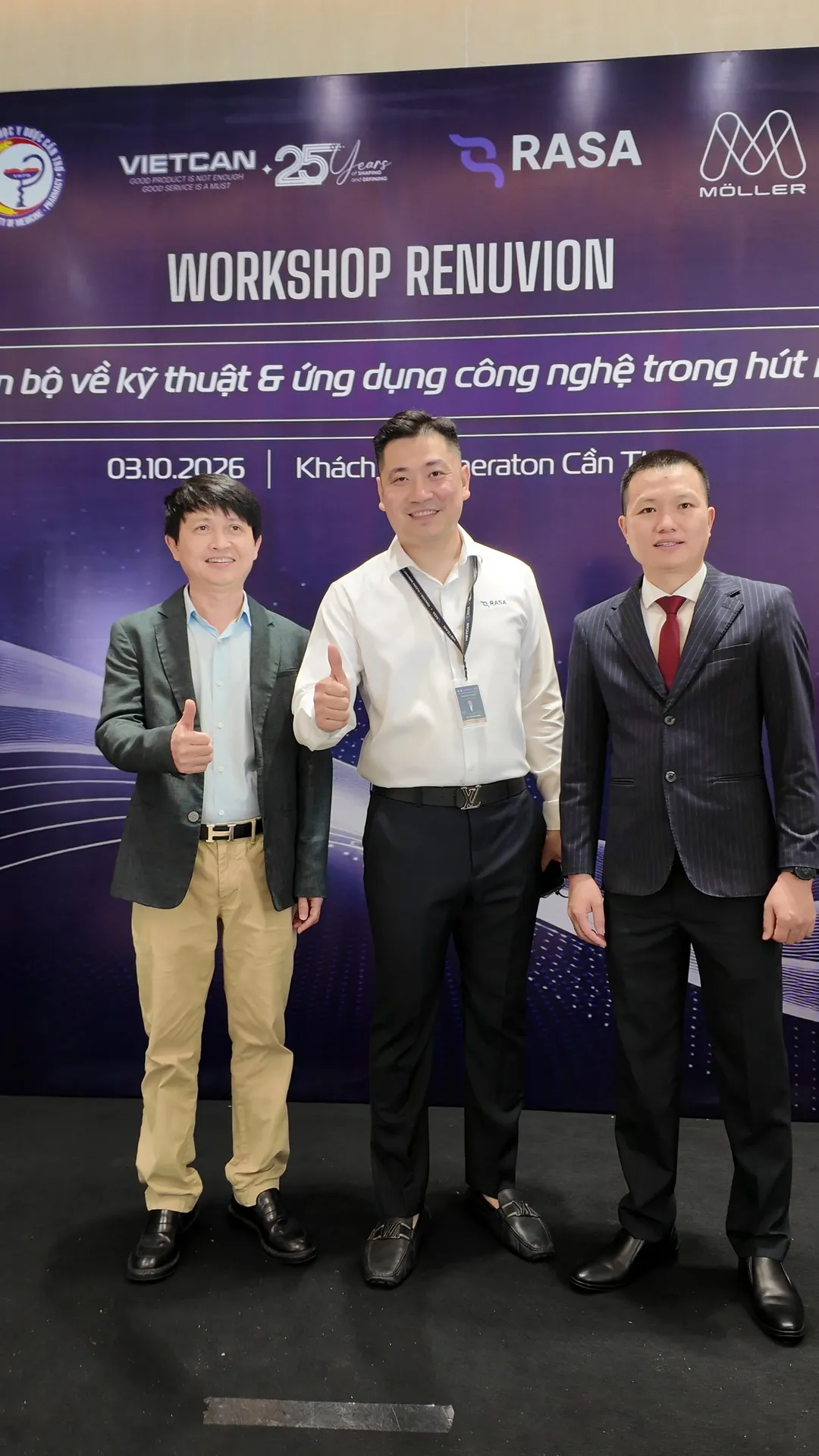 Dr. Kien with colleagues at the workshop reception area