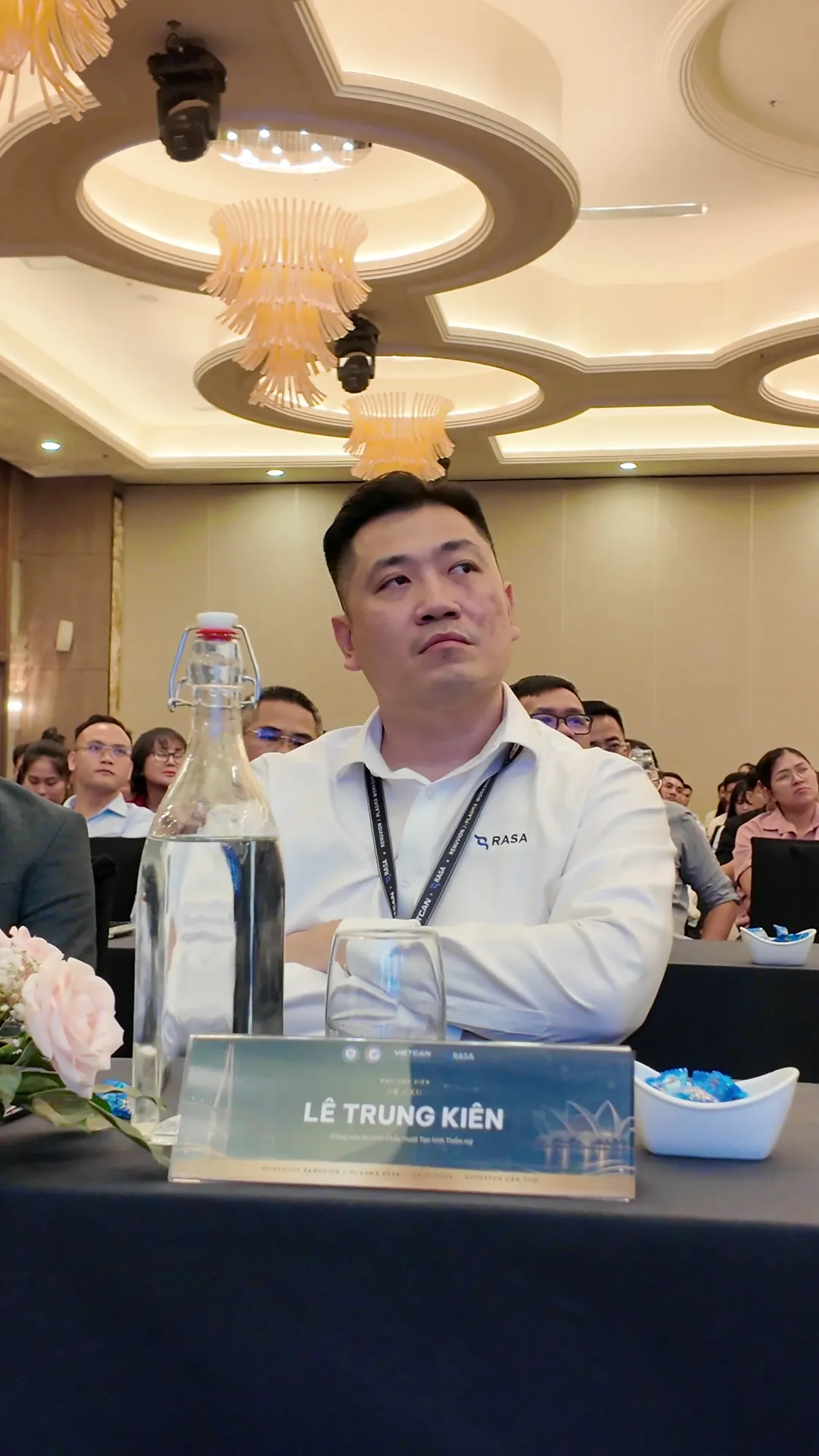 Dr. Kien following the lectures from the delegate seats